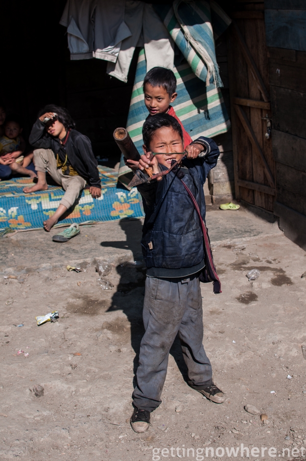 Boy with slingshot