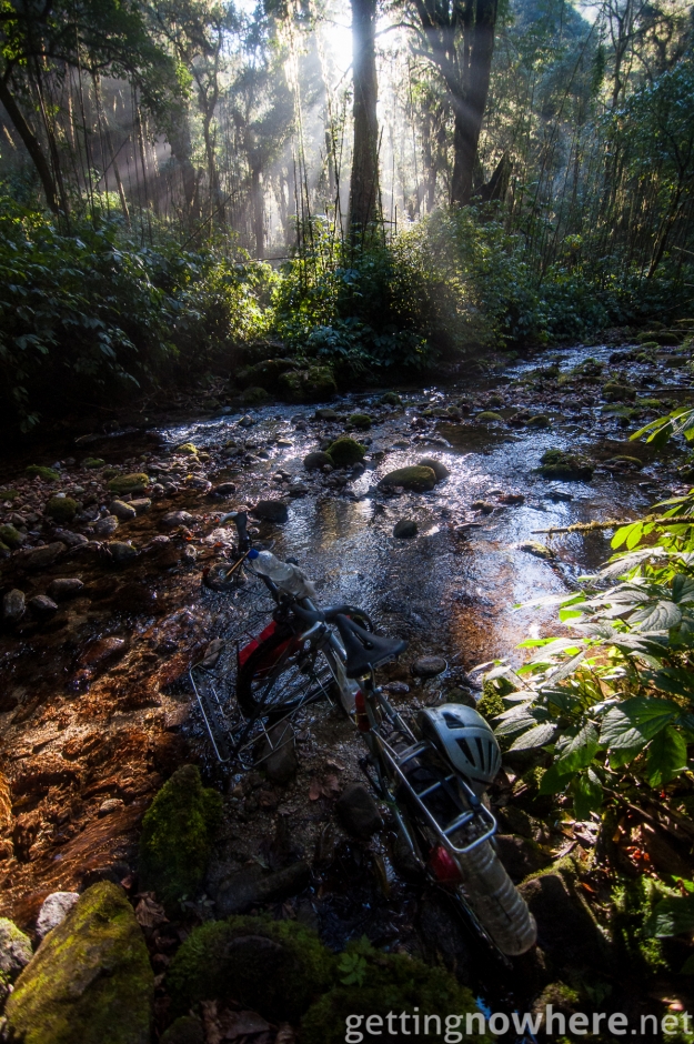 With the bike across a jungle river