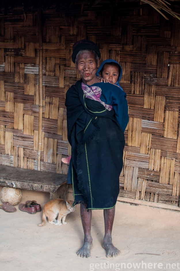 Old Naga man with his grandchild